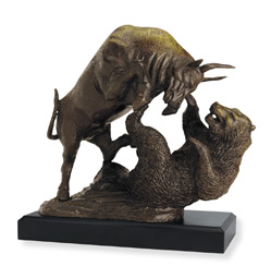 statue of a bull overpowering a bear