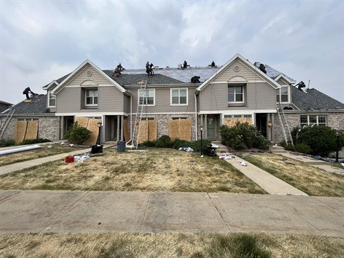 Badgerland Exteriors & Solar crew in action: Multi-family roof replacement in Madison, WI
