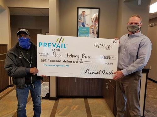 Prevail Bank donates $1,000 to PHP - People Helping People 
