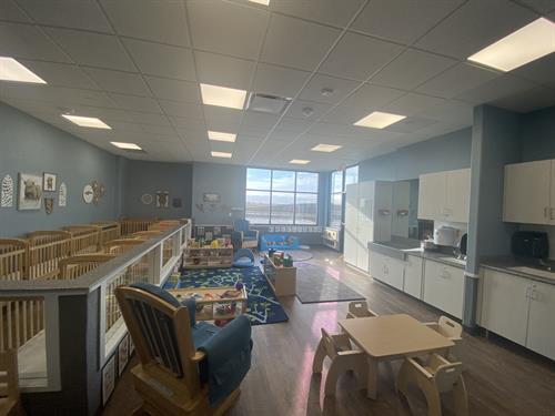A infant room at New Horizon Academy Urbandale.