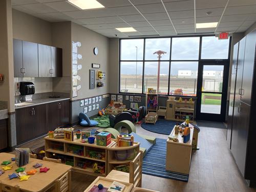 A toddler room at New Horizon Academy Urbandale.