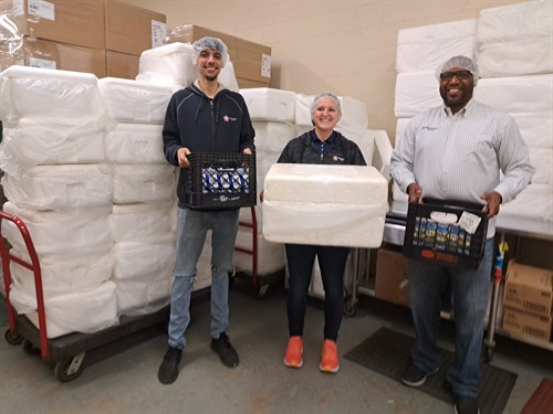 Help pack the meal coolers for delivery with friends or colleagues!
