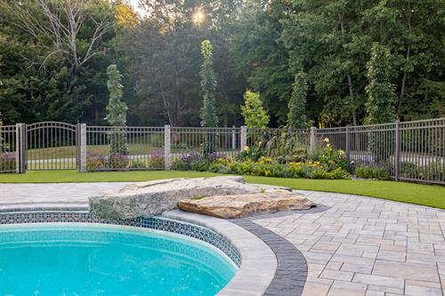 Gallery Image Pool_with_copper_statue_garden_in_back.jpg