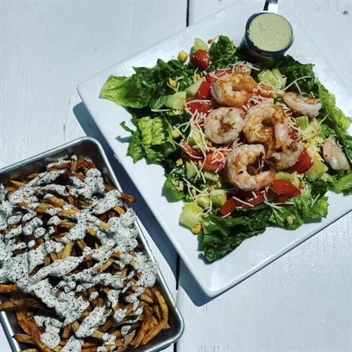 Rhythm Chopped Salad with a side of Truffle fries