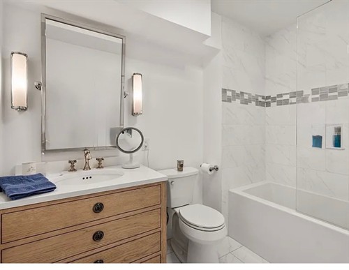 Gallery Image bathroom-remodel-wood-vanity-tile-surround-newburyport-ma.jpeg