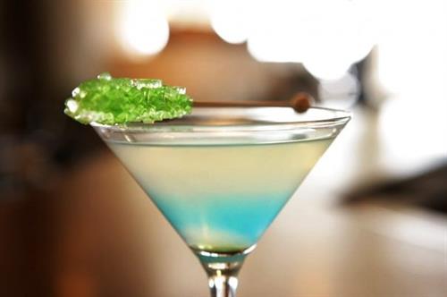 The Seaglass Signature Martini served with aqua-colored rock candy.