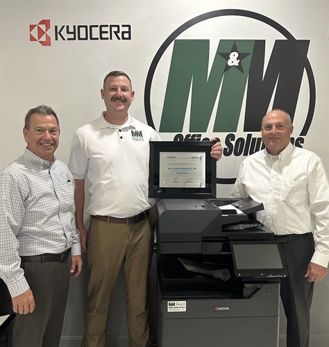Owners Gerry and Nick Townsend receiving the 2026 Kyocera Silver Partner Award