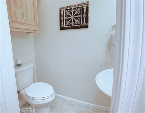 Half bathroom in hallway 