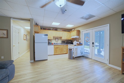 Kitchen with dishes, silverware, pots and pans 