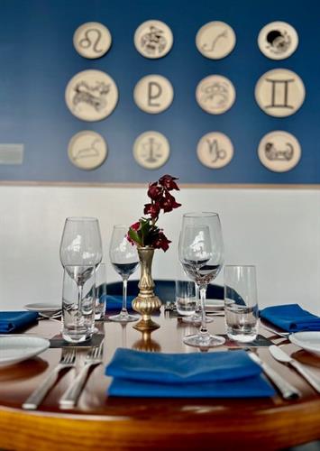Gallery Image Circle_Table_with_Cosmic_Plates_-_Aurora.jpg