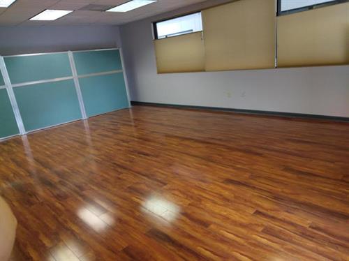 This is our group meeting room without furniture. This works for movement classes like yoga and Tai Chi.