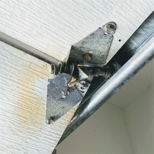Garage Door Broken Hinge