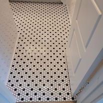 Stunning tile job on a bathroom floor.