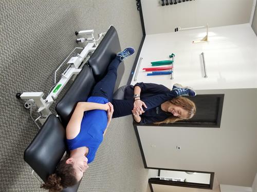 Dr. Sarah Stineman treating a patient.