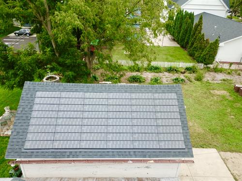 Solstice and Certainteed Landmark Pro Shingles in Moire Black. 
