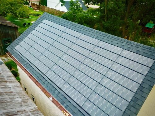 Solar roof replacement in Moire Black. 
