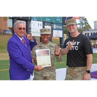 Northwestern State alumna CPT Dominitra Charles honored during homecoming football game