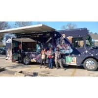 Your Library on Wheels: New Schoolmobile Brings Books to Parish Students