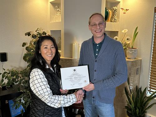 Stephanie Juha recieving her CONTROL System Certification