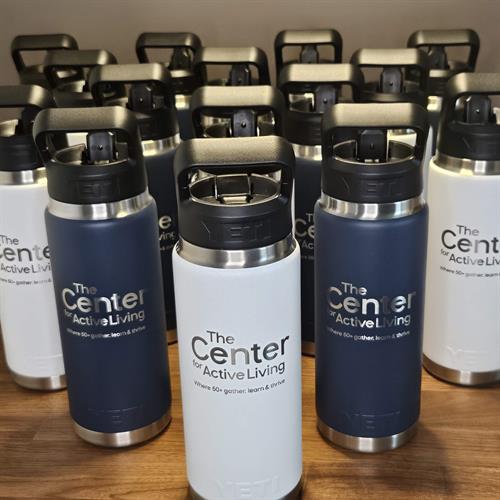 Laser-engraved blue and white Yeti water bottles for The Center for Active Living