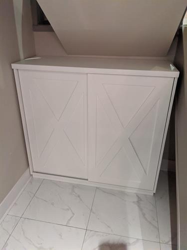 custom designed cabinet with bypassing doors