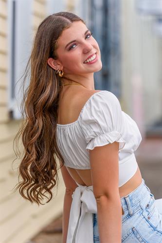 High School Senior Photography on a sidewalk