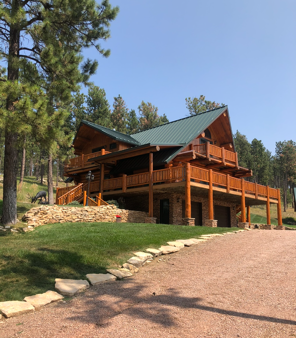 Gallery Image Metal_Roof_Log_Cabin.png