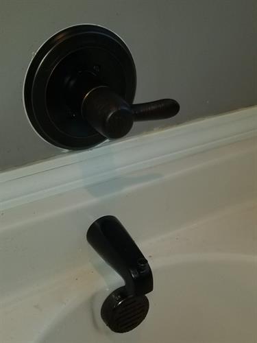 Install new tub handle and faucet