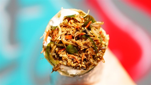Slow roasted Asian Pulled Pork Burrito with hand shredded Soy Ginger Slaw