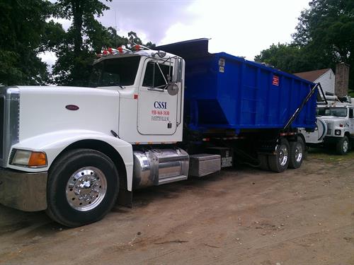 Gallery Image Rollofftruck.jpg Gallery Image Rollofftruck.jpg