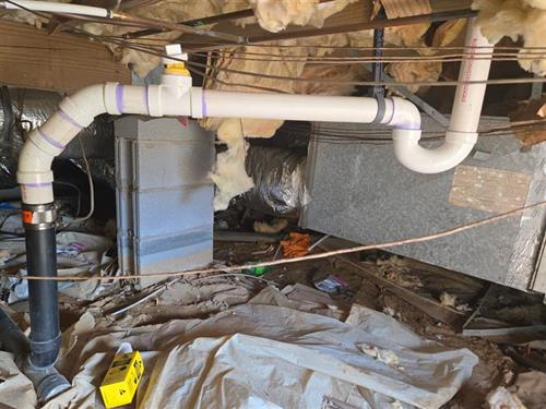 Clean crawl space plumbing in Fayetteville, NC. Heavenly Throne Plumbing.