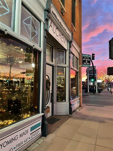 Alchemy Storefront with one of Lander's famous sunsets. 