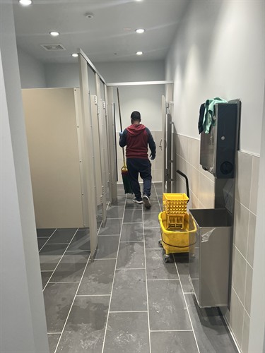 Jani-Serv, Inc. Staff cleaning bathrooms for building in Salt Lake City