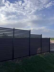 Modern horizontal slat fence