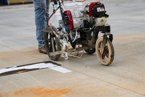 Laying down fresh striping.