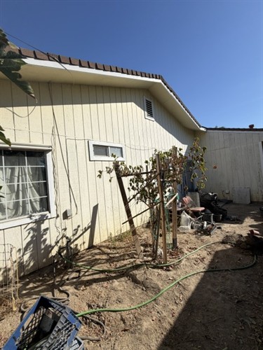 As-is house Visalia side yard