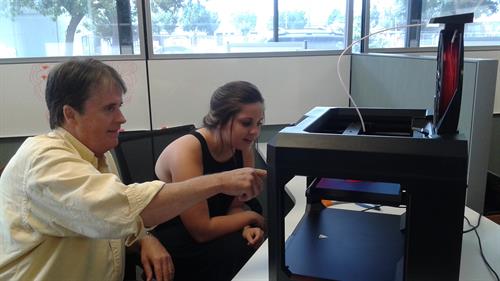 Teaching on how to use the 3D printer.