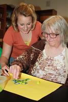 Gallery Image Mary_Making_Fused_Glass_Art_with_Instructor.JPG