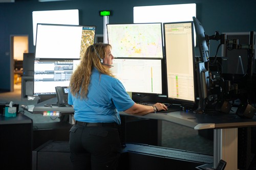 Gallery Image med_dispatcher_standing_at_desk.jpg