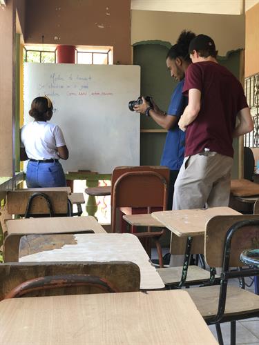 Creative Director Tim Hall teaching a local film maker in the Dominican Republic