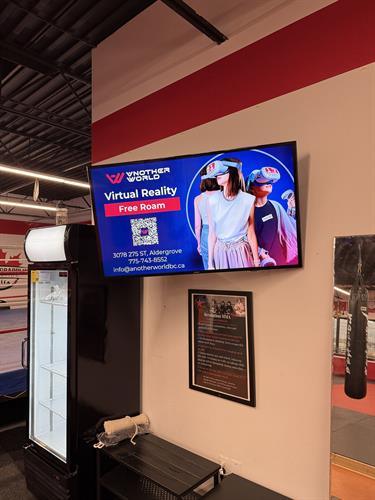 Local business ads running on our Langley venue screens