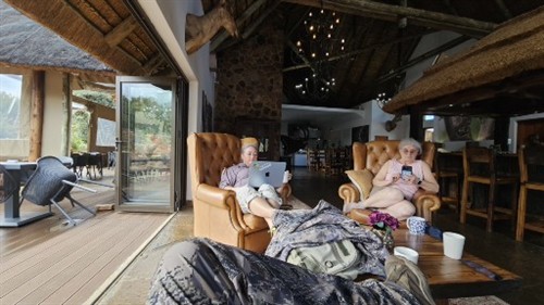 Travel planning doesn’t stop when I’m travelling — working on client itineraries between safari adventures in Africa.