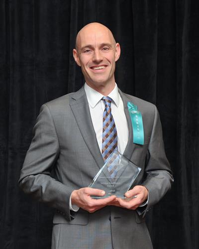 Dan winning Langley Chamber of Commerce Best New Small business award 2015 