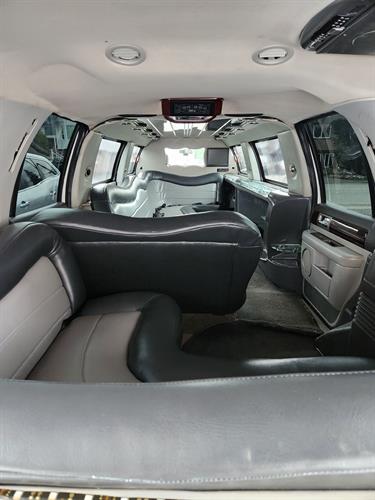 Interior pic of 1 of our 12 passenger SUVs