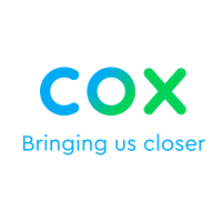 Ribbon Cutting for Cox