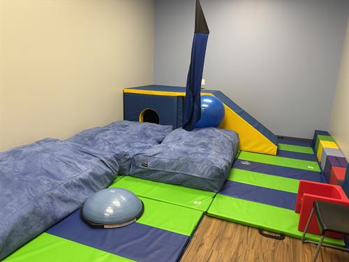 Large Gym- more sensory fun- view of playhouse area 