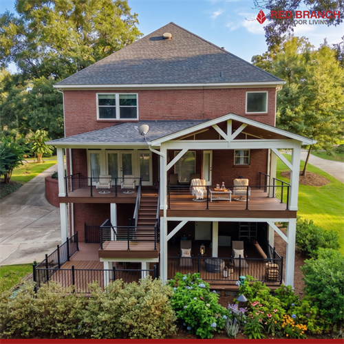 Maximizing every square foot of your back elevation. From the spacious covered upper deck to the functional multi-level landings below, we build custom spaces designed around the way your family actually lives.  