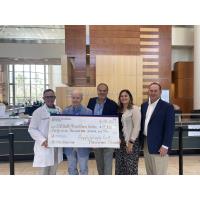 Mitchell Cancer Institute Receives Donation from Piggly Wiggly Golf Tournament