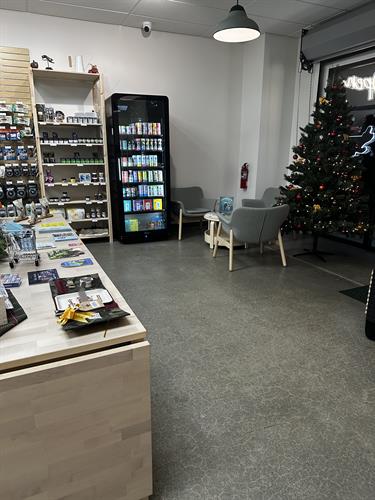 A curated selection of cannabis beverages at Farmhouse Artisan Market, featuring refreshing, precisely dosed options for a smoke-free experience.