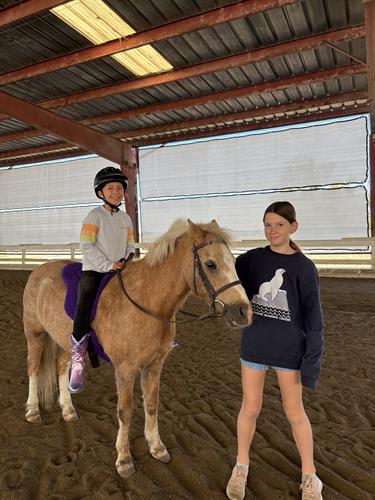 Gallery Image kids-horseback-riding-nature-connection-activities-strides-riding-academy.jpg